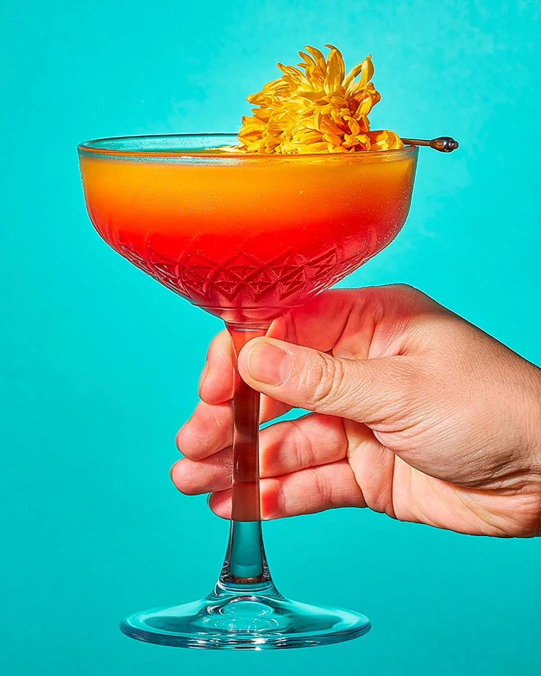 Mango Sunrise de Tequila Don Ramón Punta Diamante decorado con flor comestible